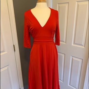 Red v neck dress with pockets